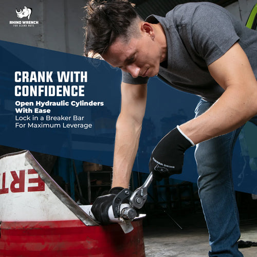 Rhino Gland Nut Wrench in Action: Crank with confidence using a breaker bar for maximum leverage on hydraulic cylinders - Professional 1266 and 7463 style wrench for heavy machinery repair.